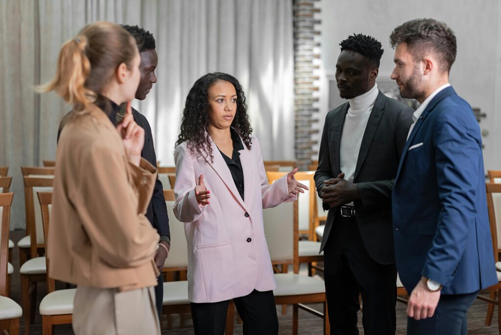 A group of people in the middle of a conversation.
