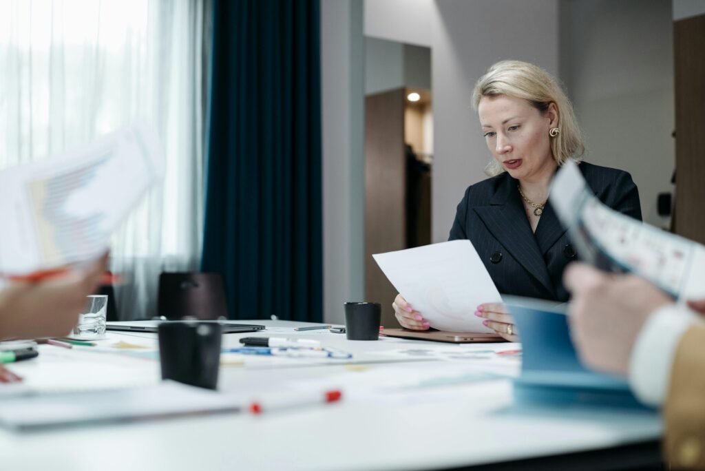 A woman reading a document.